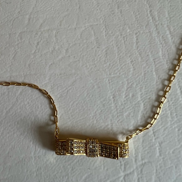 Kate Spade Goldtone Plated & Cubic Zirconia Bow Pendant Necklace - Picture 4 of 4